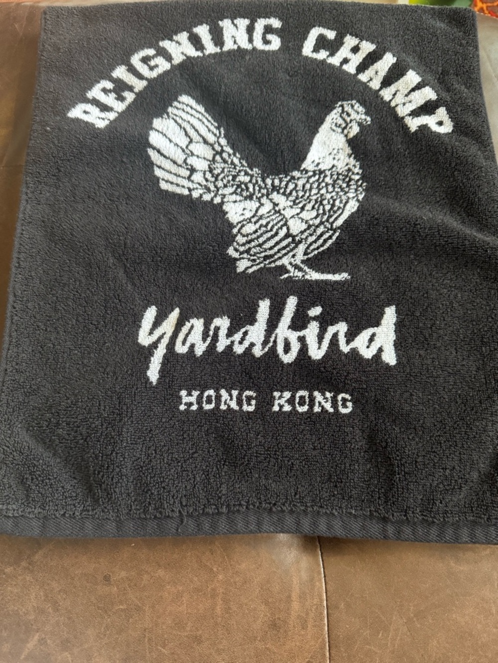 Reigning Champ Black Towel with White Yardbird Graphic
